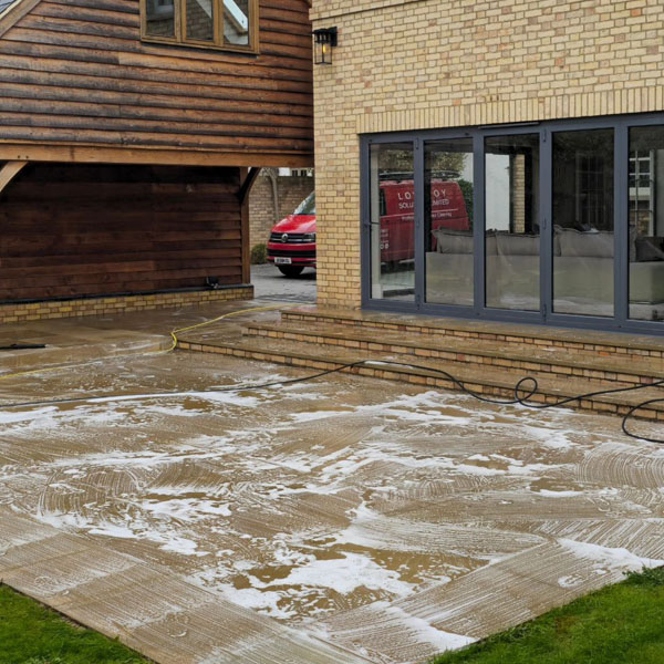 Patio Cleaning Services in Hertfordshire - Chemical Solution being used to clean Patio