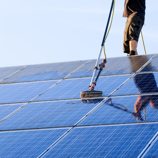Solar Panel Cleaning Services in Hertfordshire - Solar panel cleaning with brush