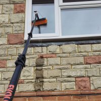 Window Cleaning Services in Hertfordshire - Window cleaning using telescopic pole